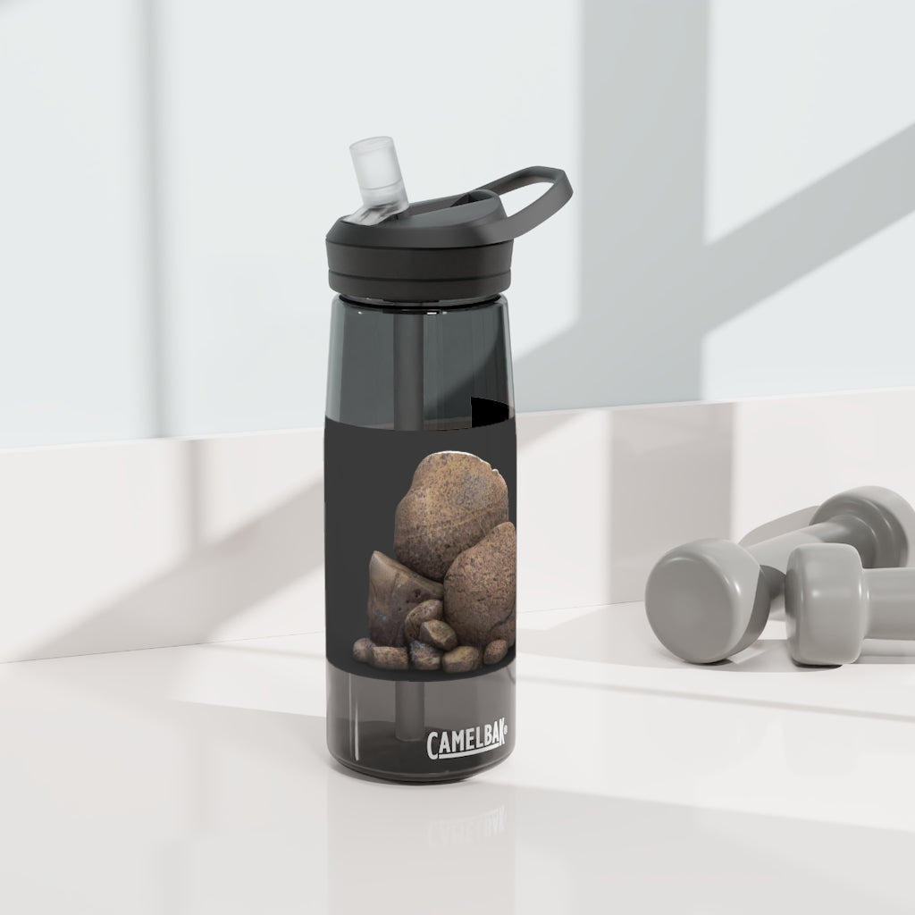 Rocks CamelBak Eddy® Water Bottle in 20oz and 25oz sizes, showcasing its durable Tritan™ material and spill-proof design.